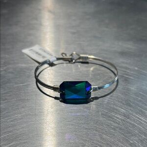 Silver Bangle Bracelet with Blue-Green Faceted Stone